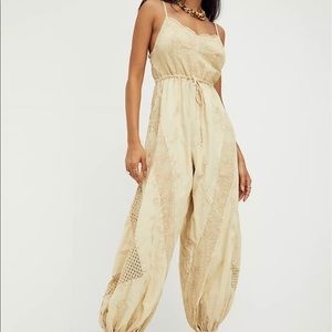 NWT Free people jumpsuit- size L